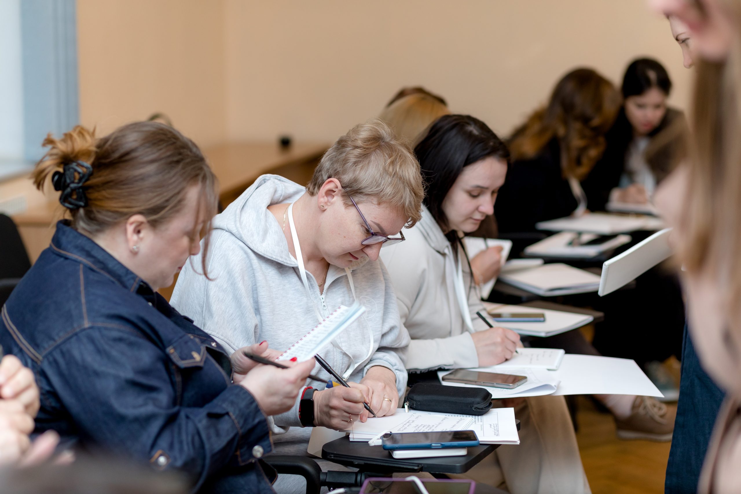participants of the training of trainers workshop taking notes